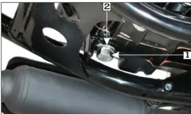 Technical diagram of a vehicle's suspension system with labeled components 1 and 2