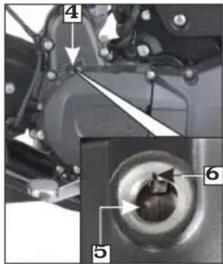 Technical diagram of a mechanical assembly with numbered components and directional arrows indicating motion or flow.