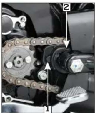Technical diagram of a mechanical gear system with labeled components and directional arrows indicating motion or assembly.