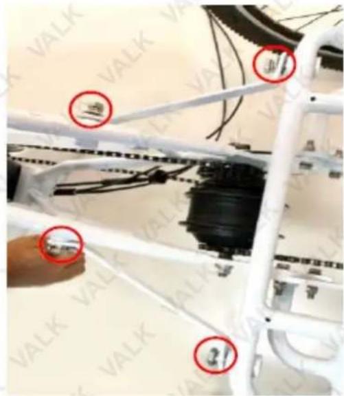 Close-up of a mechanical assembly with red circles highlighting specific components, including numbered parts and labeled parts 'VALK'.