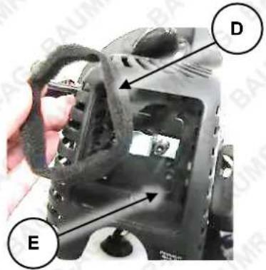 Close-up of a camera component with labeled parts D and E, showing mechanical components and wiring.