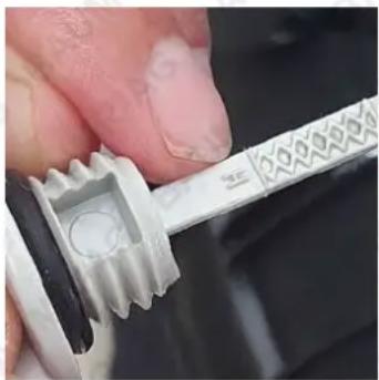 Baumr-AG 660EX - Step 3: Inspect the Oil Dipstick and wipe it with a clean cloth. - 1
