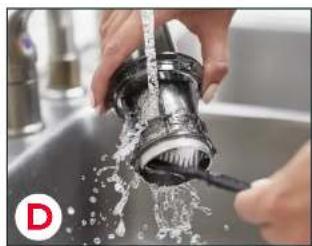 Close-up of hands washing a stainless steel faucet with water splashing (no text or symbols visible)