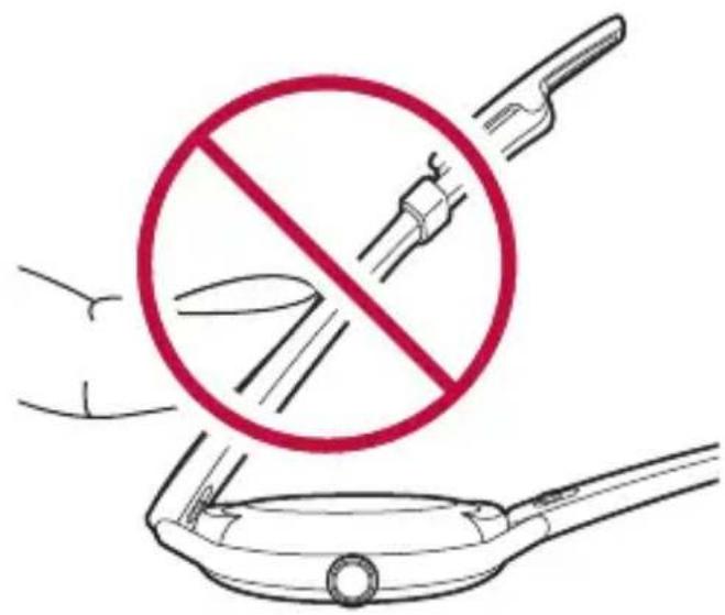 Safety warning illustration showing a crossed-out circle with no text, alongside a hand holding a frying pan and tools.