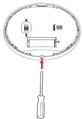 Diagram of a device with labeled components including a screwdriver, battery, and switch, showing a circular component with internal structure.