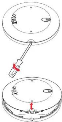 Diagram showing a screwdriver inserted into a circular device with labeled components and directional arrows indicating movement or assembly.