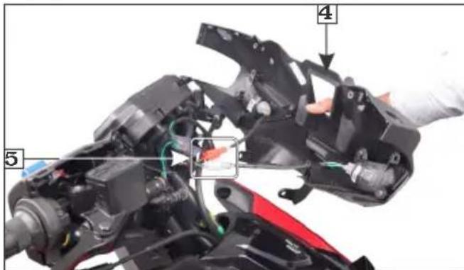 Labeled mechanical assembly diagram showing components like parts 4 and 5 with visible wiring and assembly details