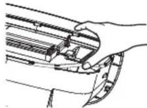 Hand holding a mechanical component with curved arrows indicating motion or force (no text or symbols)