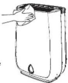 Line drawing of a hand cleaning a rectangular appliance with a cloth (no text or symbols)