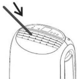 Diagram showing a device with a pointer and measurement scale, labeled with 'a' and 'b' and an arrow pointing to the measurement.