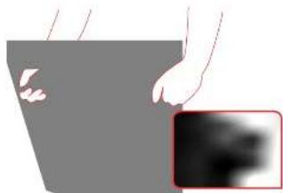 Illustration of a hand holding a gray container with a magnified inset showing a dark, blurred object (no text or symbols)