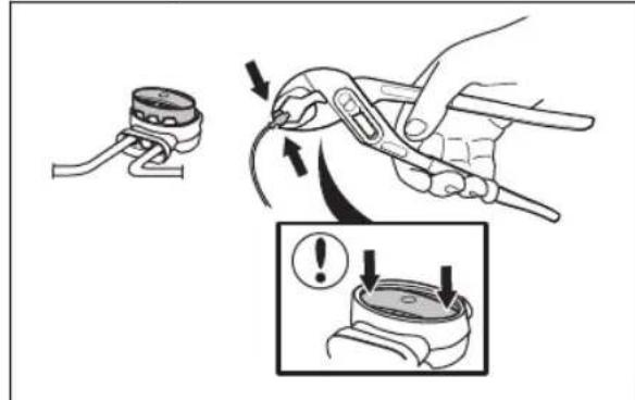 Diagram illustrating a mechanical tool manipulation step with labeled arrows and an inset showing a warning icon.