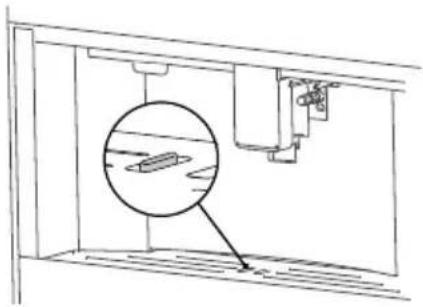Technical line drawing of a mechanical assembly with an inset magnified view of internal components (no text or symbols)