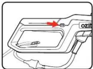 Diagram of a device with labeled components and an arrow indicating direction, possibly for assembly or inspection.