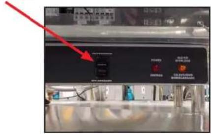 Close-up of a laboratory control panel with Chinese labels and an arrow pointing to a device, showing buttons for power, battery, and temperature.