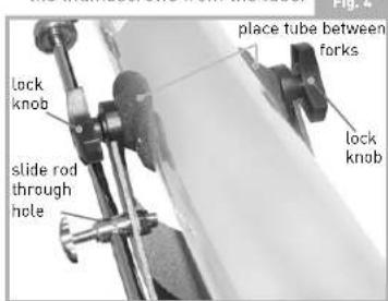 place tube between forks lock knob lock knob slide rod through hole