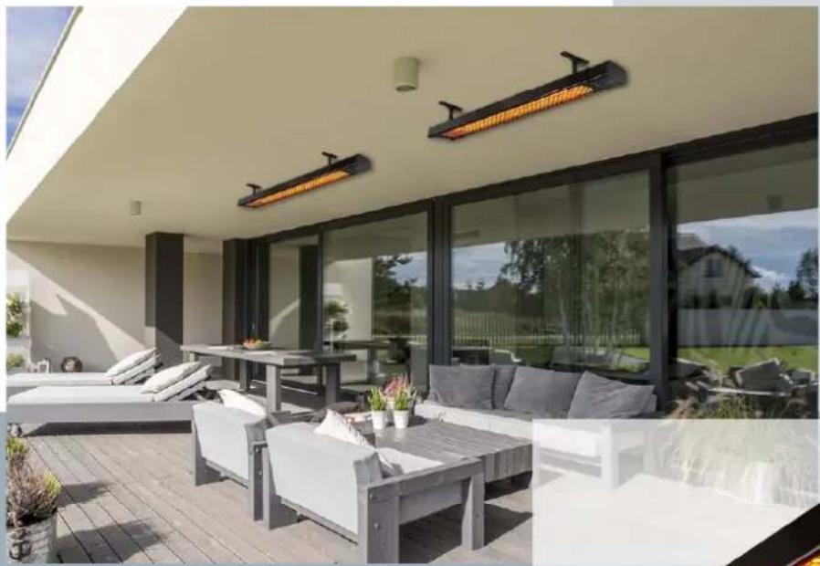 Modern residential courtyard with outdoor seating, large glass windows, and overhead lighting fixtures (no text or symbols visible)