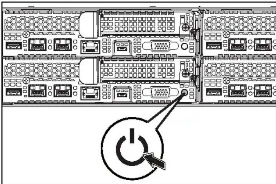 Diagram of a server rack with labeled ports and a power button icon pointing to the right side.