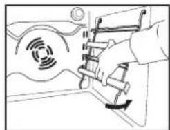 Line drawing of a hand inserting a component into a device (no text or symbols)