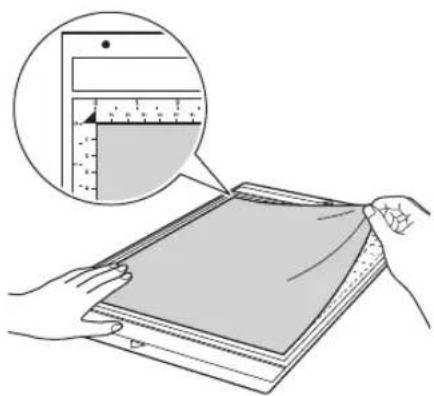 BROTHER ScanNCut CM110 - Attach the material to the mat's adhesive side. - 1