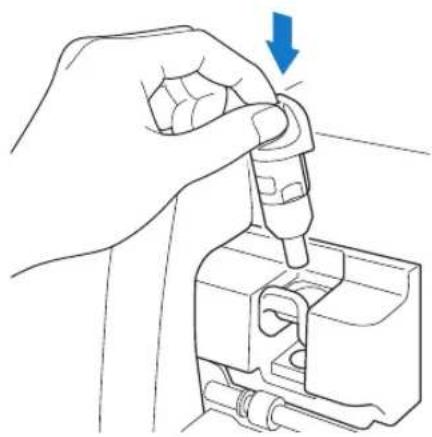 Line drawing of a hand using a pipette to adjust a mechanical component (no text or symbols)