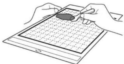 Illustration of hands using a tablet to interact with a small object (no text or symbols visible)