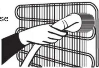 Illustration of a hand cleaning a car grille with a circular tool (no text or symbols)