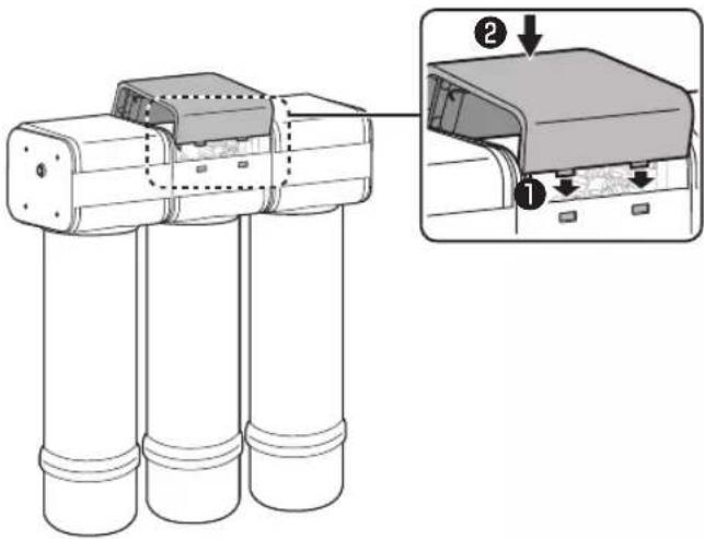 Technical diagram showing a device with three cylindrical components and an inset close-up of the component's opening, labeled with parts ① and ②.