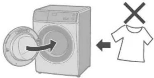 Diagram showing washing machine with door and arrow, next to a T-shirt with X mark indicating clothing or disposal.
