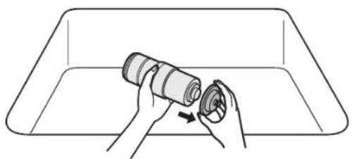PANASONIC TK-AB50 - Remove the tray from the old cartridge. - 1