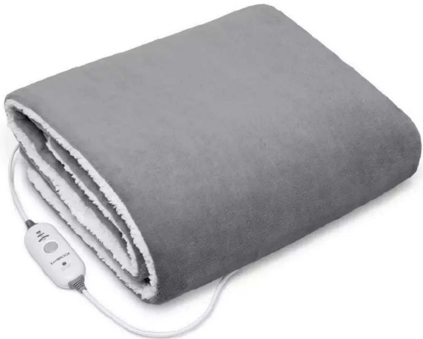 Folded gray fabric with white fur covering, connected to a white handheld device (no text or symbols visible)