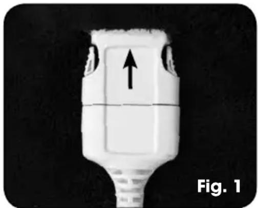 Close-up of a white plastic device with an upward arrow indicator, labeled 'Fig. 1' (no other text or symbols)