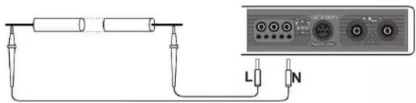 Diagram showing two cylindrical resistors connected to a terminal block with labeled terminals L and N