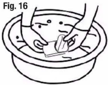 Line drawing of hands washing a basin with a soap can (no text or symbols)