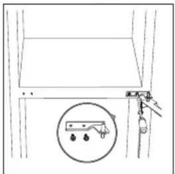Simple line drawing of a cabinet or lift with a hanging hook and a circular inset showing three small objects (no text or symbols)