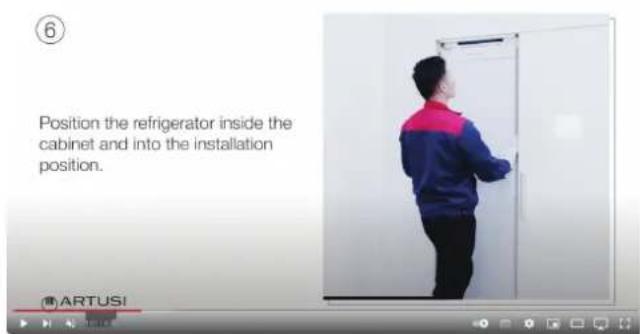 Position the refrigerator inside the cabinet and into the installation position.