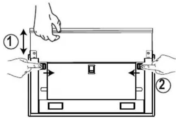 Diagram showing two hands holding a ruler above a rectangular device with labeled parts and directional arrows