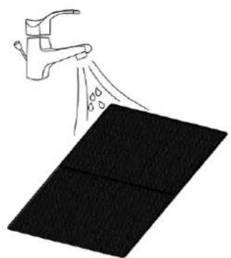 Illustration of a faucet spraying water onto a black rectangular surface (no text or symbols)
