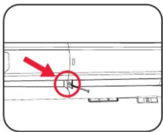 Technical diagram showing a red arrow pointing to a circular component with a scale, likely indicating measurement or alignment.