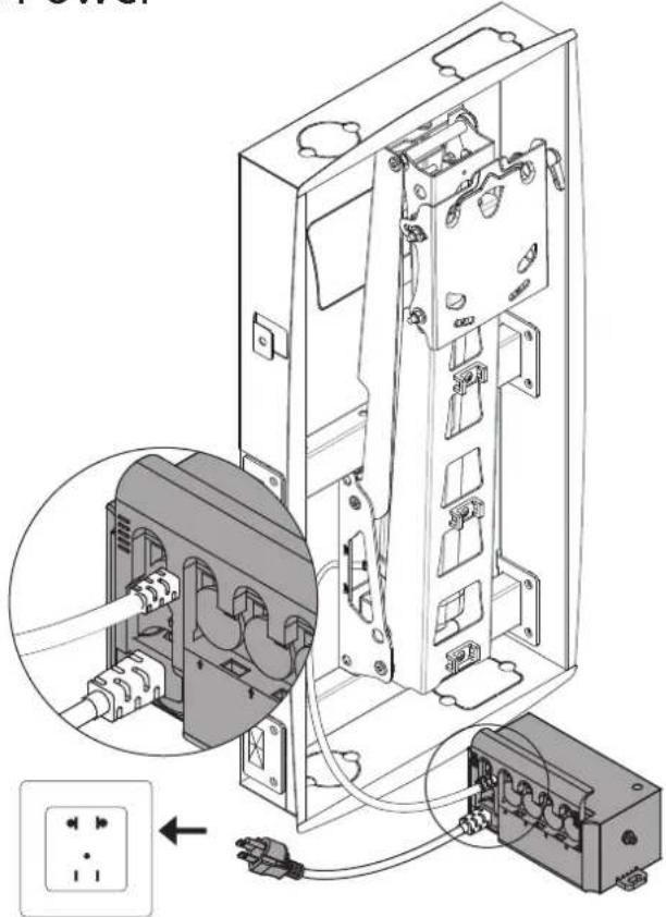 Technical diagram showing internal components of an electrical enclosure with wiring and a power outlet, including a magnified inset view.