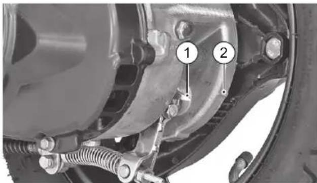 Technical diagram of a vehicle suspension system with labeled components 1 and 2