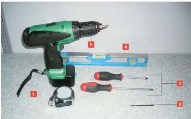 Labeled photo of a green electric drill with numbered parts for assembly or repair reference.