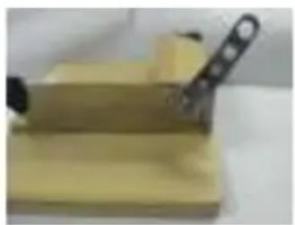 Mellerware Biltong King BC002 - Attach the blade to the bolt extending from the raised wooden block. Position a white nylon washer on either side of the blade and then tighten the Nylon - 4