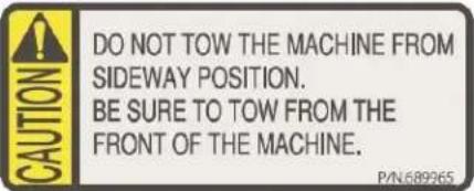 DO NOT TOW THE MACHINE FROM SIDEWAY POSITION. BE SURE TO TOW FROM THE FRONT OF THE MACHINE.