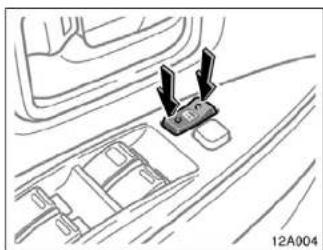 Diagram of a car interior showing a vehicle's seat and dashboard with two arrows pointing to the seat (no text or symbols present)