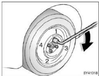 Diagram of a mechanical component with numbered parts and a directional arrow, no readable text or symbols present.