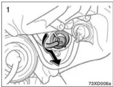 Mechanical assembly diagram showing a rotating component with directional arrows (no text or symbols)