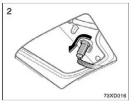 Diagram of a mechanical component with a curved arrow indicating direction, no text or symbols present