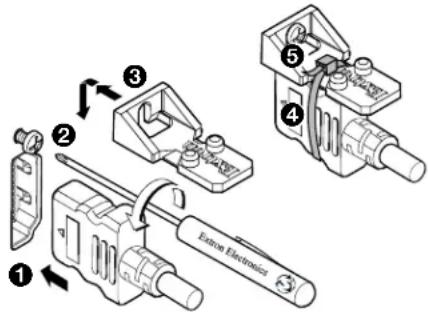 Technical diagram showing exploded view of a mechanical assembly with numbered components and a label 'Extron Electronics' on the device.