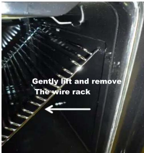 Gently lift and remove The wire rack